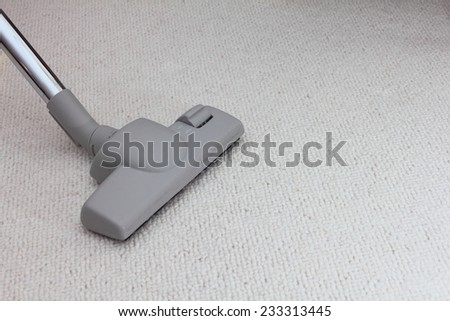 vacuum cleaner on a carpet