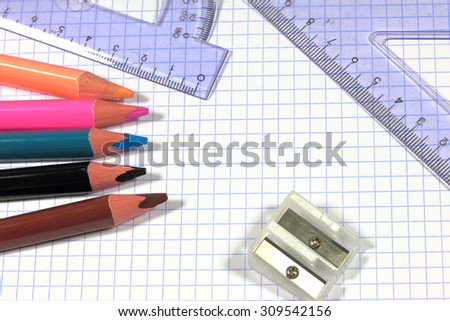 protractor square colored pencils on squared paper