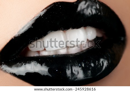 Close up shot of black lip gloss
