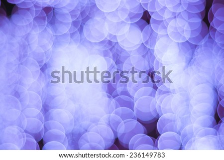 Abstract Background of blurred violet light with bokeh effect