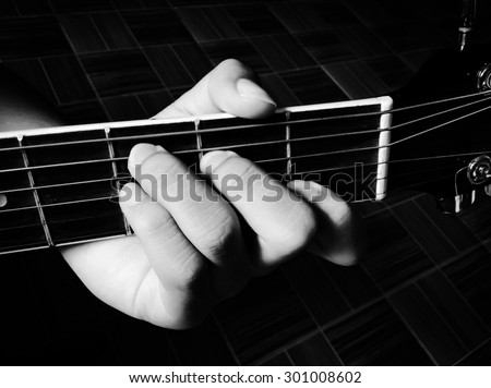 Fingers playing guitar key C music