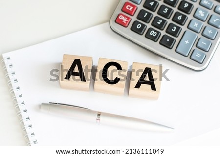 aca inscription on wooden cubes isolated on white background, medicine concept. Imagine de stoc © 