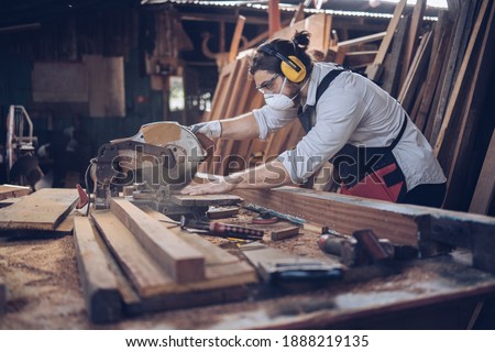 Woodworking carpenter furniture hand cuting.Man factory industry manufacturer, working workshop, maker construction. Skills artisan workshop factory. 商業照片 © 