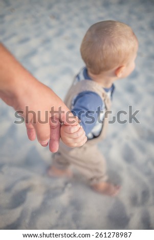 Father and son Holding hands