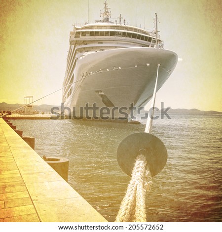 Giant ship waiting in a dock on a grungy background