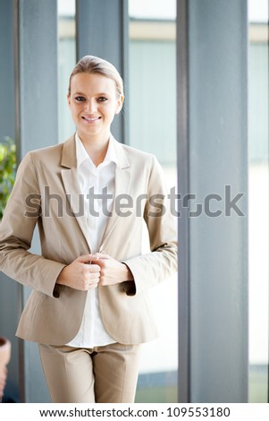 attractive young businesswoman portrait in office