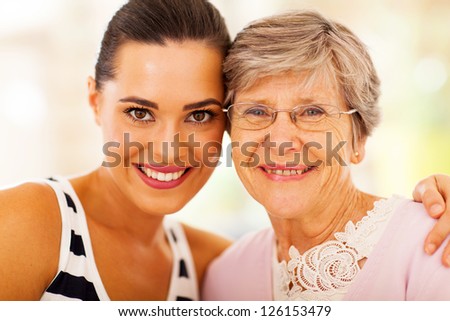 happy woman and senior mother closeup portrait