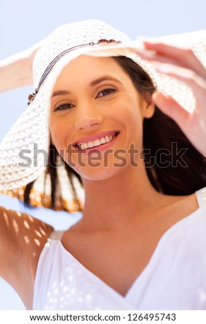 happy young woman with summer hat