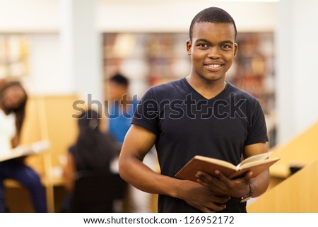 male african american university student in library