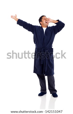 indian man yawning and stretching isolated on white background
