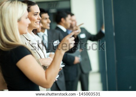business people chatting while having tea break
