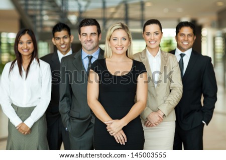 portrait of modern business team inside office building