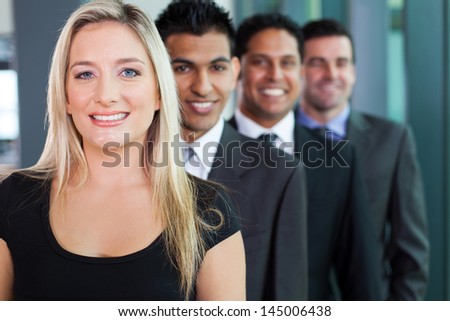 successful business group in a row smiling