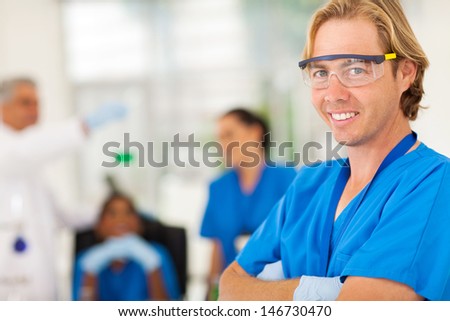 smiling scientist in the lab