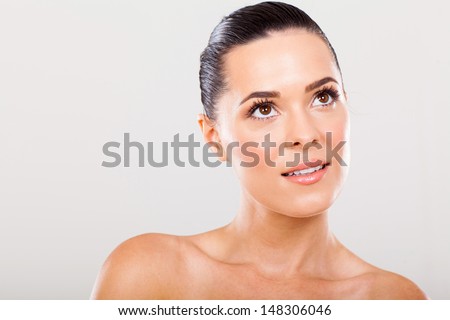 studio shot of beautiful woman on plain background