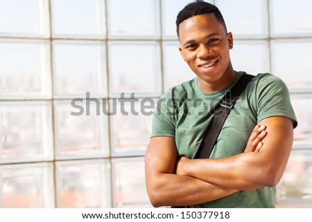 cute afro american guy with arms crossed