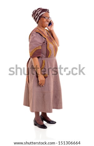 happy elderly african woman talking on cell phone isolated on white