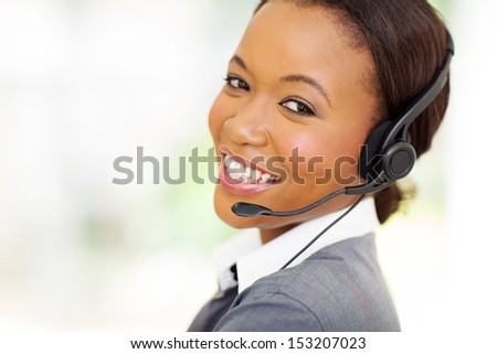 headshot of beautiful female african call center operator