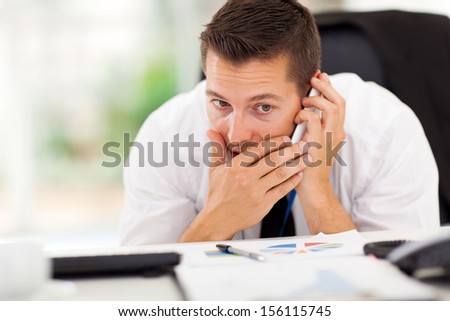businessman taking a private call during working hour