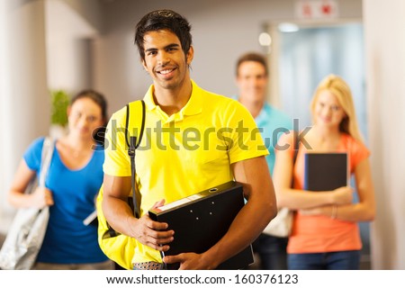 happy male college student and friends on campus