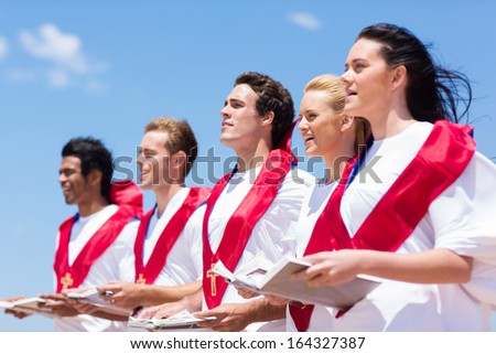young church choir singing outdoors
