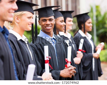 happy multiracial university students graduation