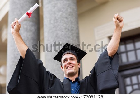 successful male university graduate after graduation