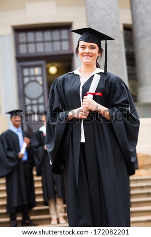 successful female graduate at university graduation