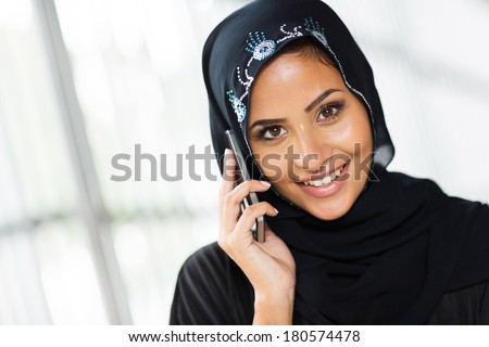beautiful young arabian woman talking on cell phone