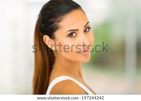 portrait of pretty woman looking back