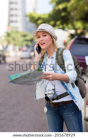 lost tourist making phone call and asking for direction