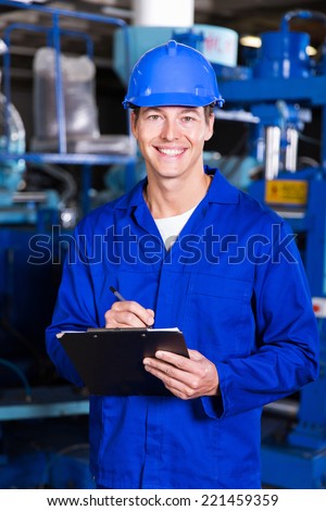 handsome factory manager in production area