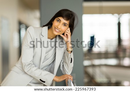 elegant young indian business woman in office