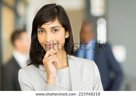 beautiful indian business woman looking at the camera