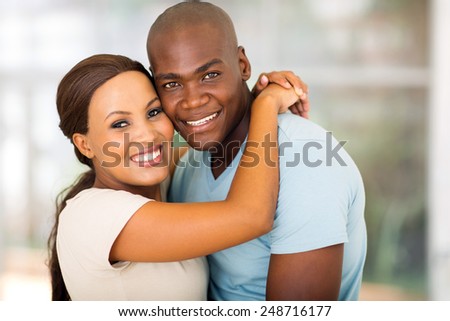 beautiful afro american couple hugging