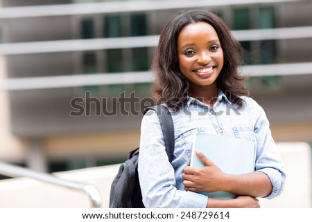 attractive african female college student on campus