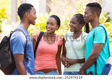 group african college friends chatting outdoors