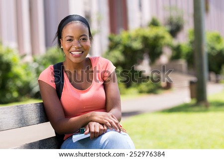 happy african american college student outside campus