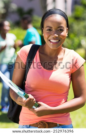 attractive female african college student on campus
