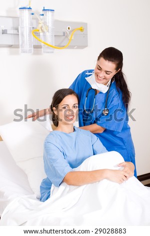 female doctor helping patient sitting up