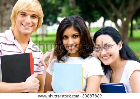 group portrait of young happy college students