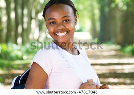 smiling african american female college student