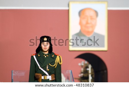 BEIJING, CHINA - DECEMBER 17: A paramilitary police officer guards Tian'anmen square on December 17, 2009 in Beijing, China.
