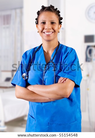 young happy african american nurse in hospital