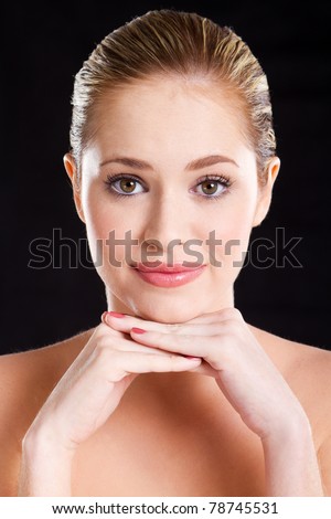 beautiful young caucasian woman portrait on black background