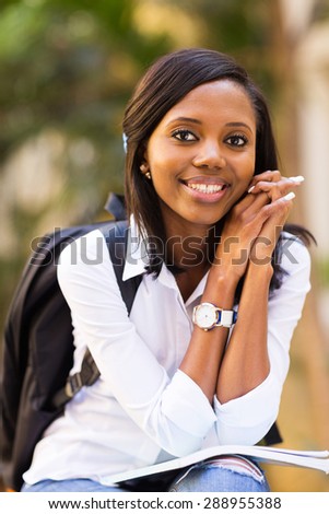 happy african american college student outside campus