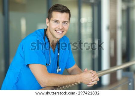 relaxed medical worker with stethoscope at modern hospital