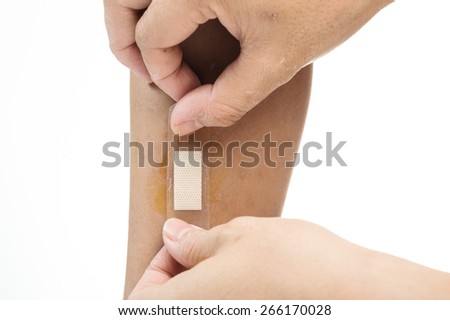 White Plaster that cover wound on kid leg