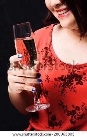 Close up red lip Asian young woman smile and hold champagne in hand