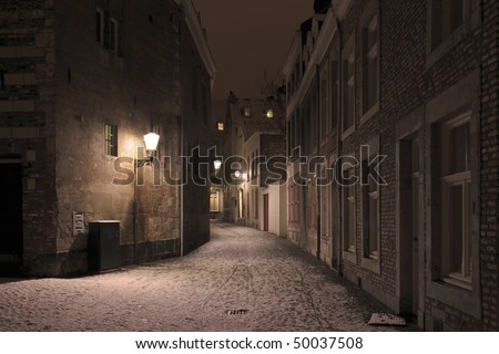 Old street in the center of Maastricht on a wintry night